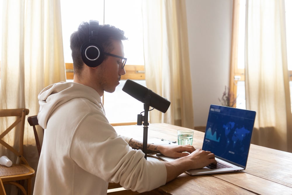 man using a mic - Voice Over Software