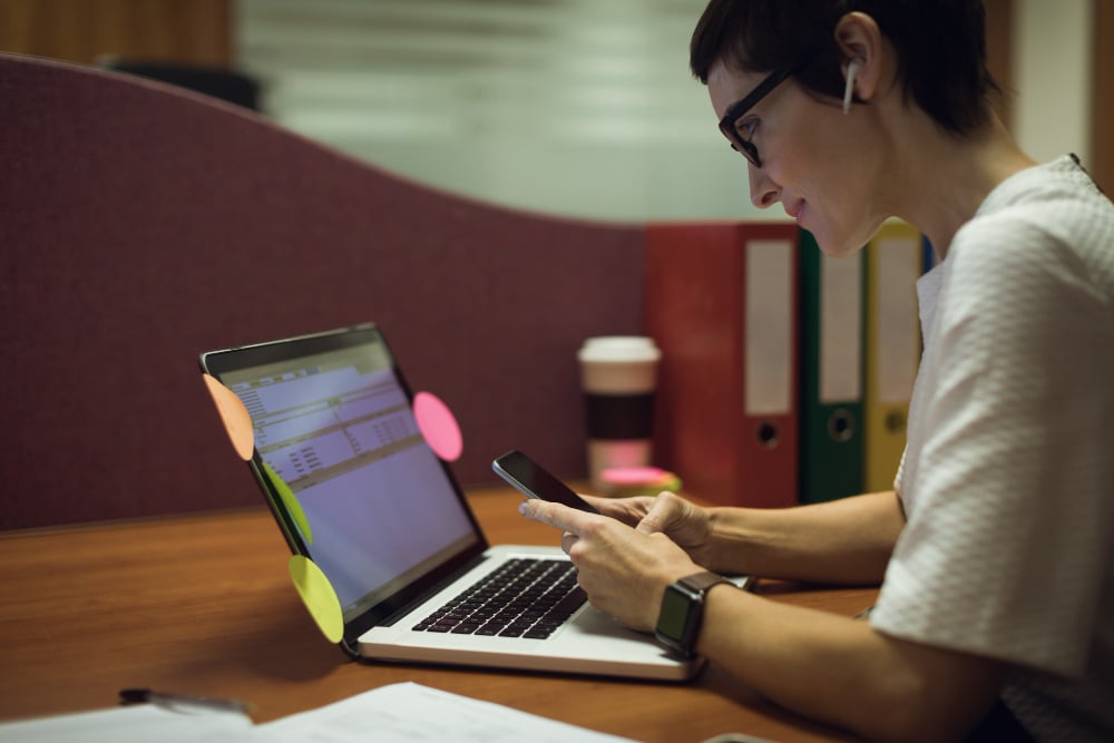 woman using a laptop - What Is TTS?