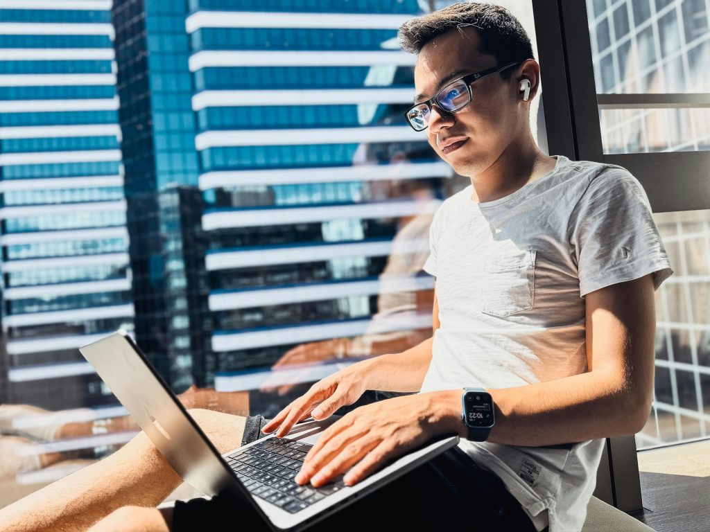 student using a laptop - Text-to-Speech Google Docs