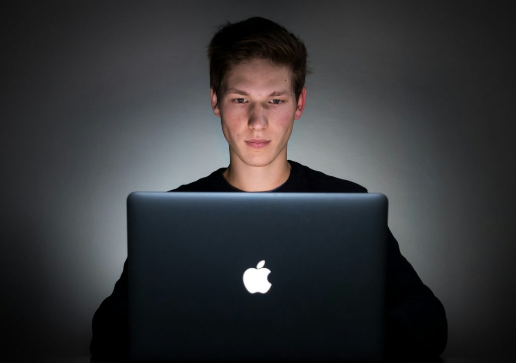 student on a laptop - TTS Bot Discord
