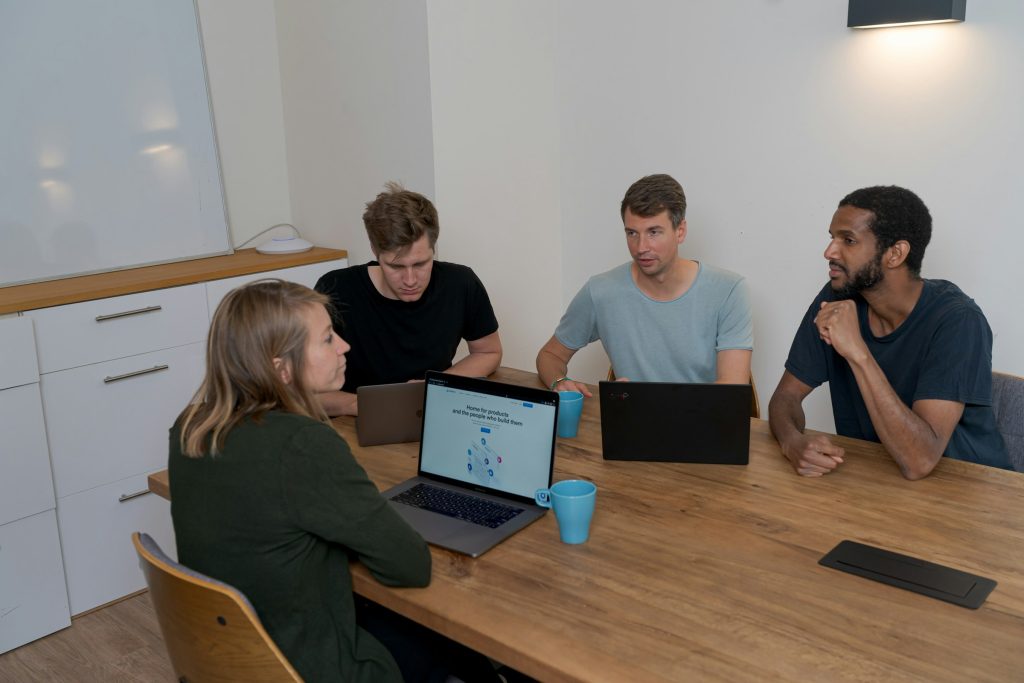 employees in a meeting - Conversational AI in Banking
