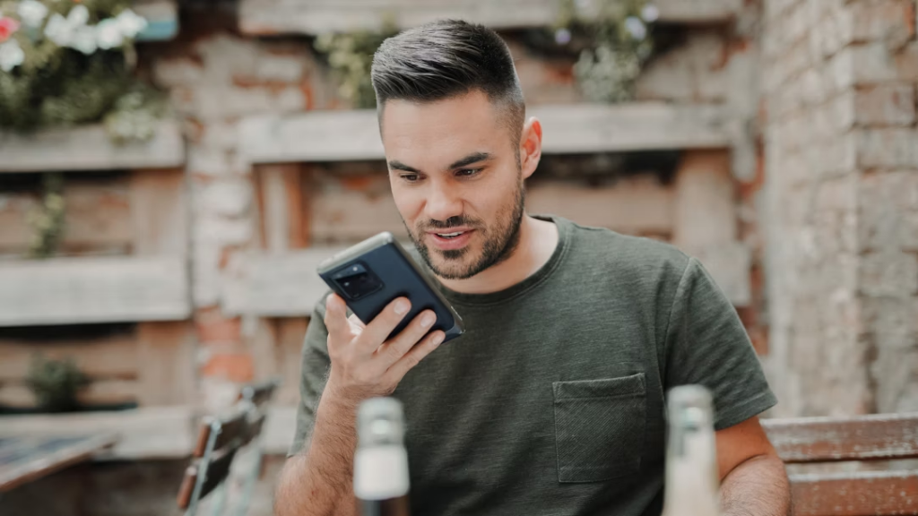 man in a green shirt - How to Change Text-to-Speech Voice on TikTok