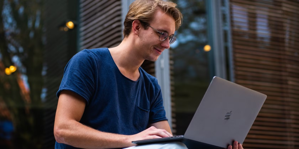 man in a blue shirt - How to Text-to-Speech on Mac