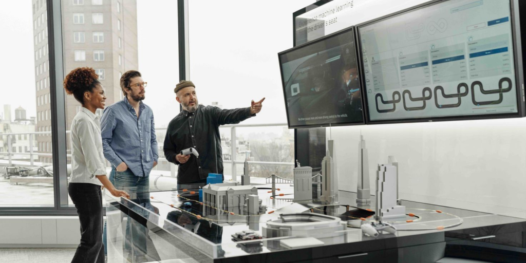 office staff talking - How to Use AI in Sales
