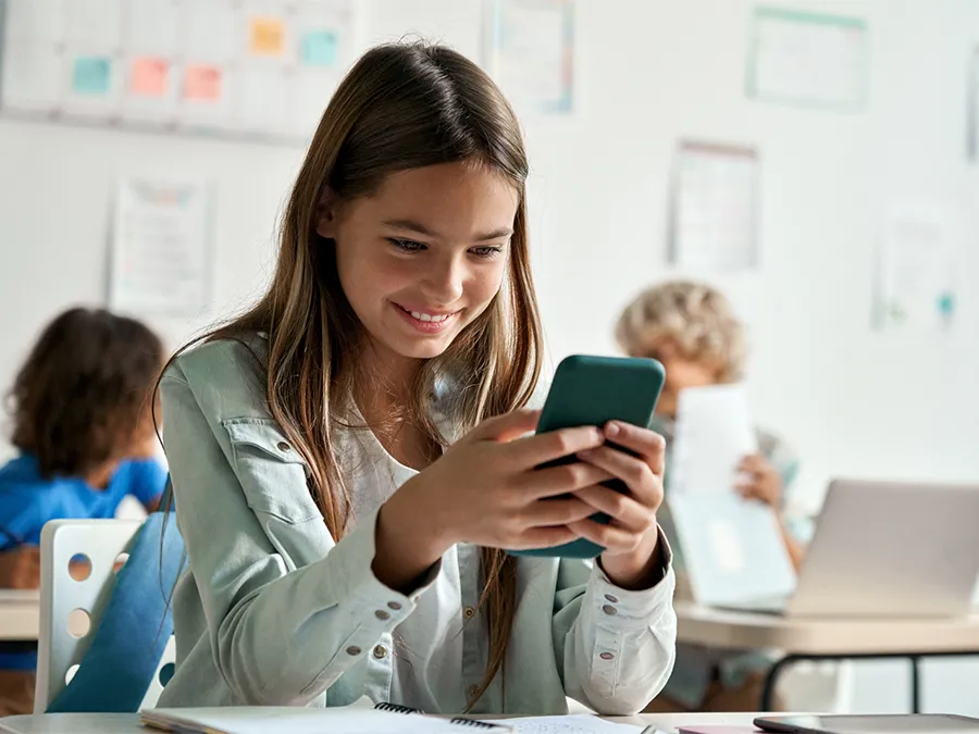 girl using phone - How to Add Text to Speech on Reels
