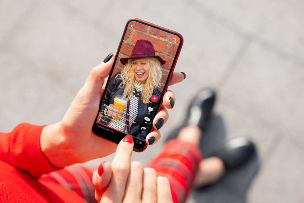 woman using phone - How to Add Text to Speech on Reels