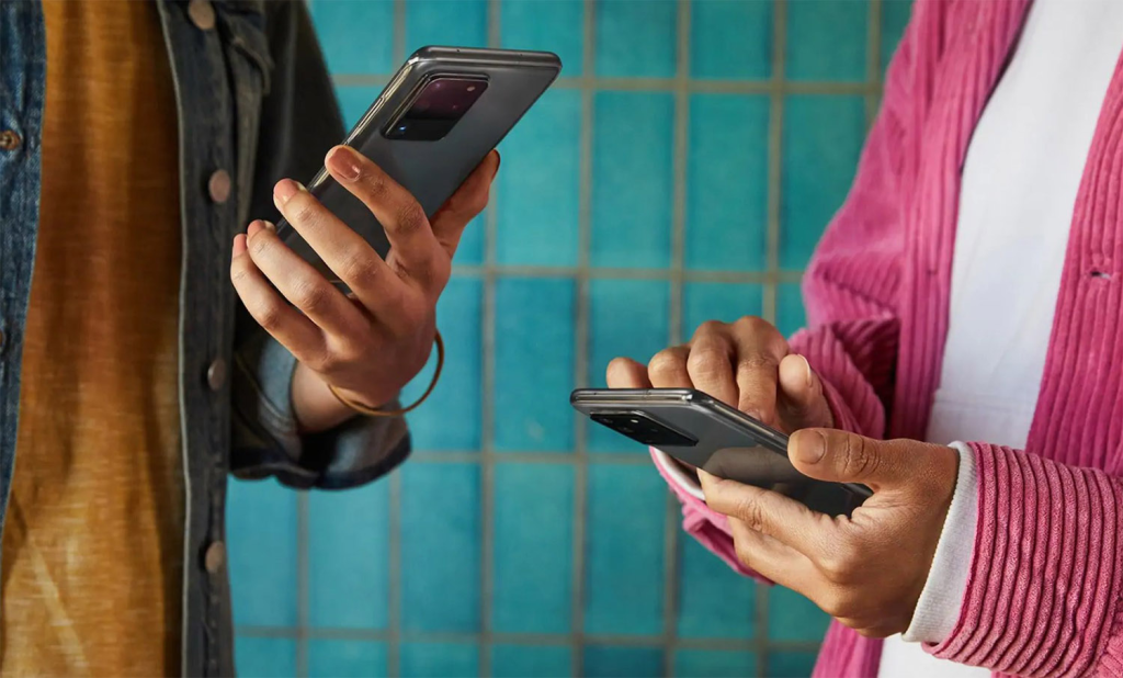 people using their phones - How to Use Text-to-Speech on Samsung