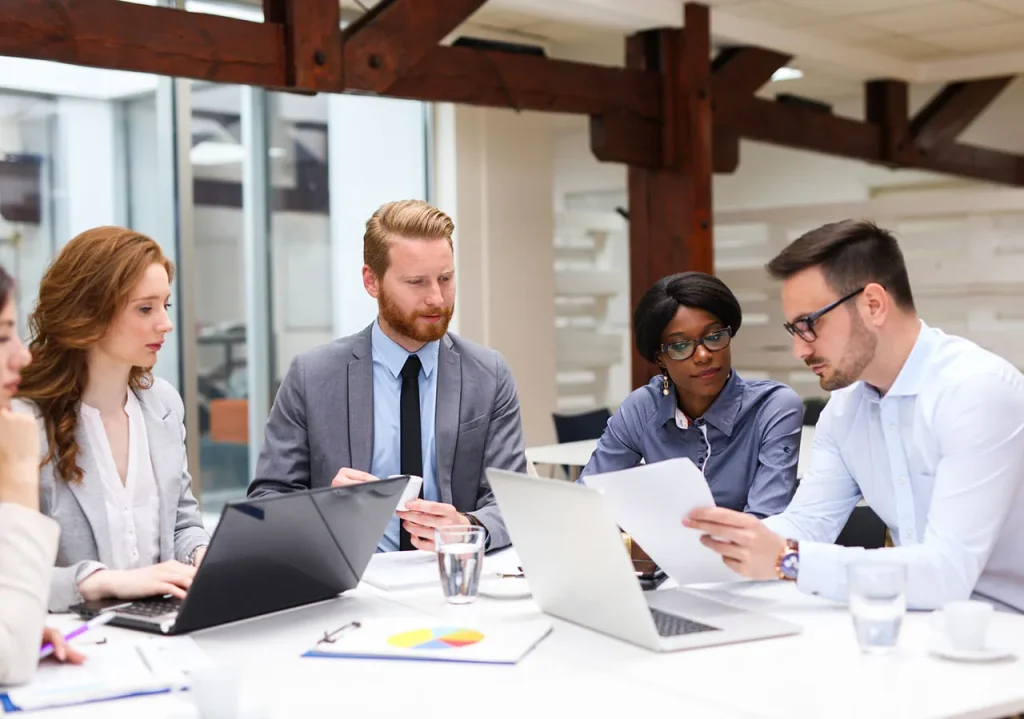 employees talking -  How to Create a Phone Tree
