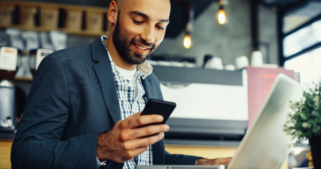 man using his phone - Conversational Business Texting