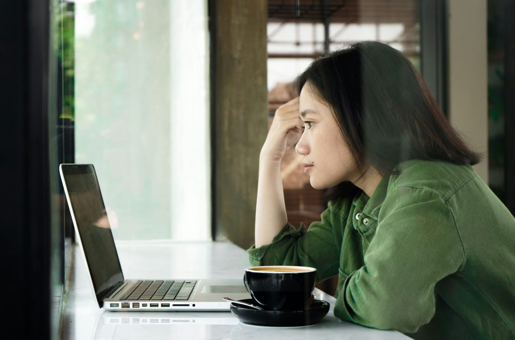 woman using a laptop - Twilio Flex Demo