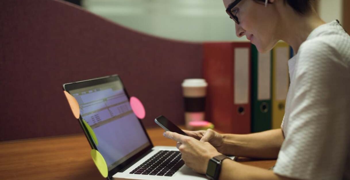 woman using a laptop - What Is TTS?