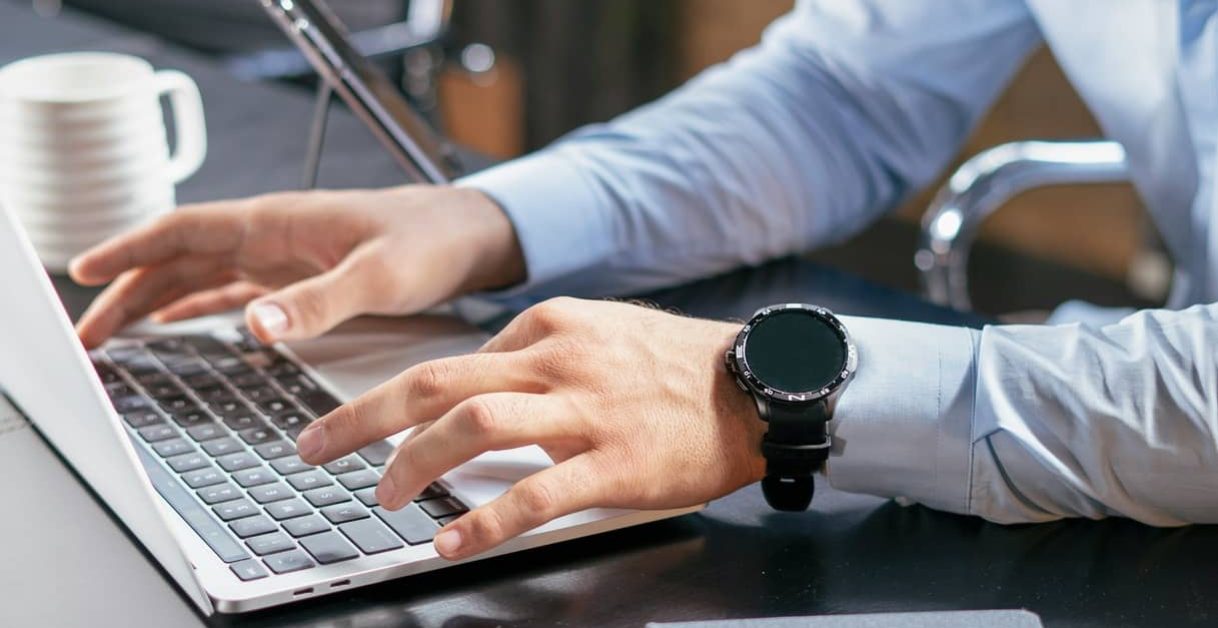 man using a laptop - Text-to-Speech Google Docs