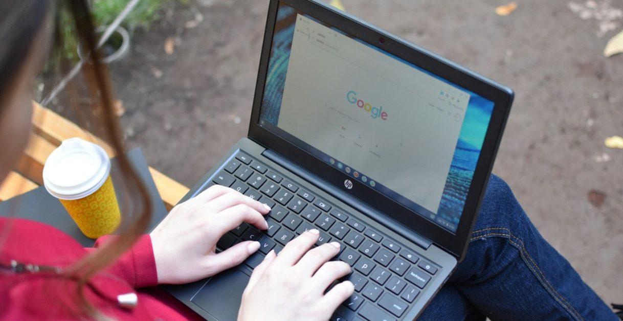 Woman Using Laptop - ElevenLabs Alternatives